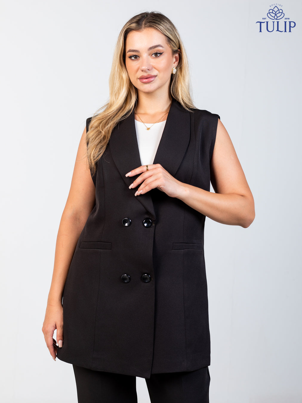 Sleeveless blazer Black bottoms