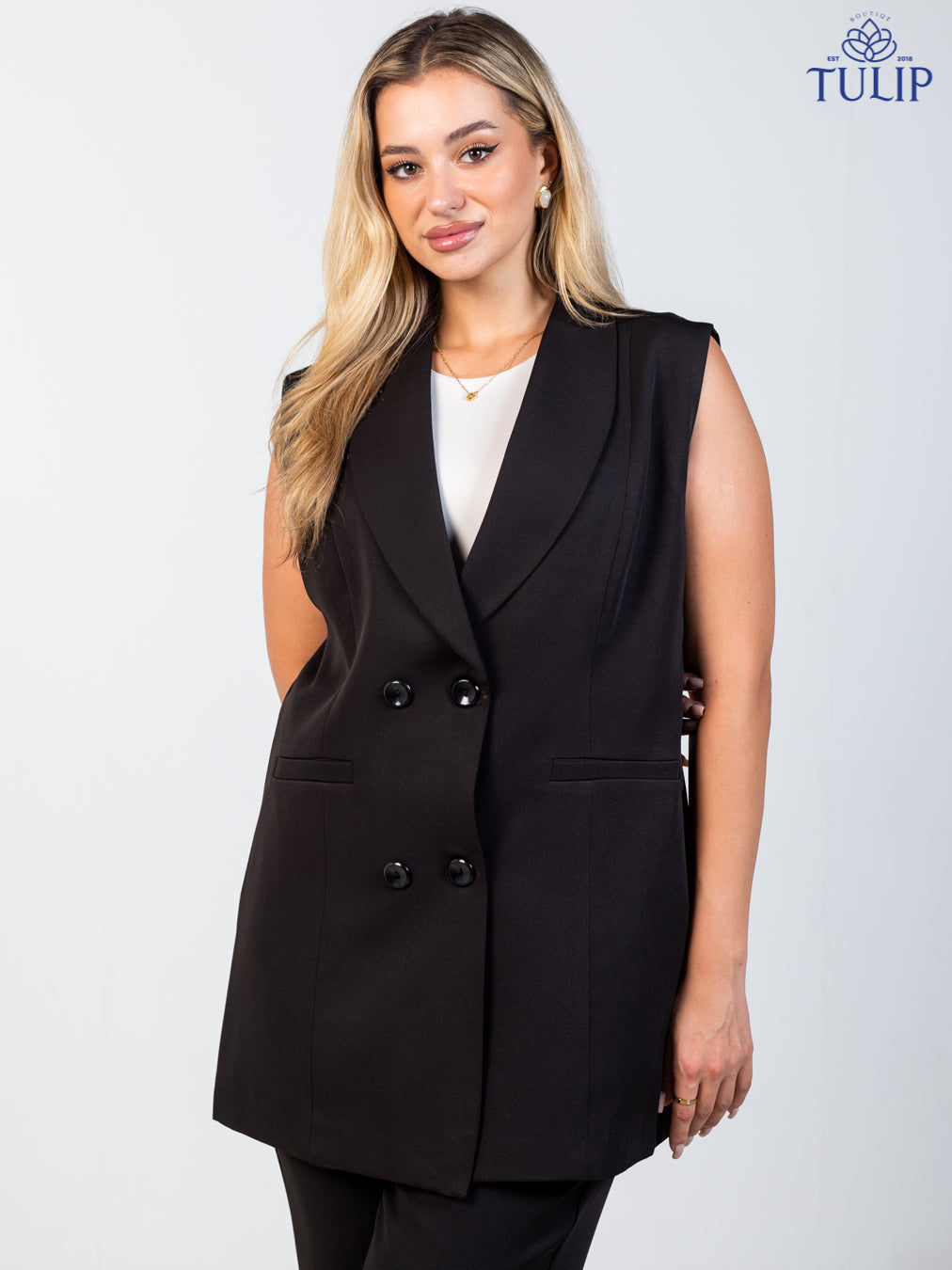 Sleeveless blazer Black bottoms