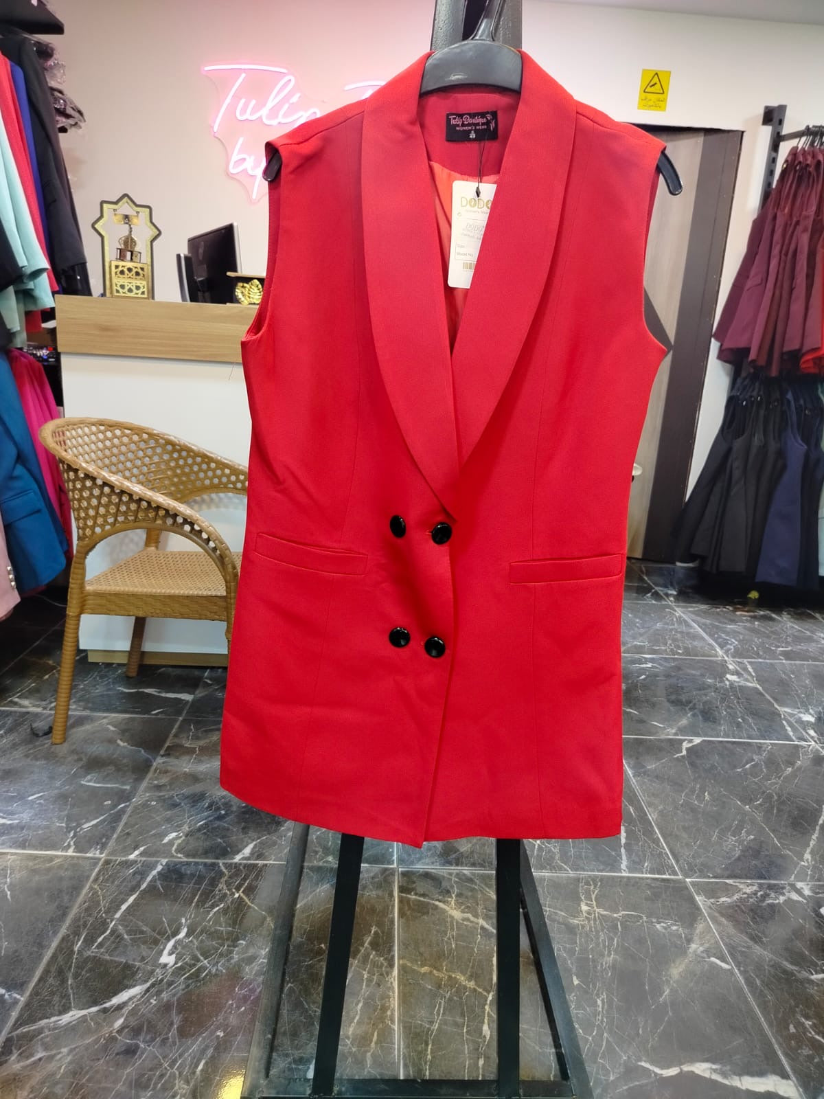 Sleeveless blazer Black bottoms